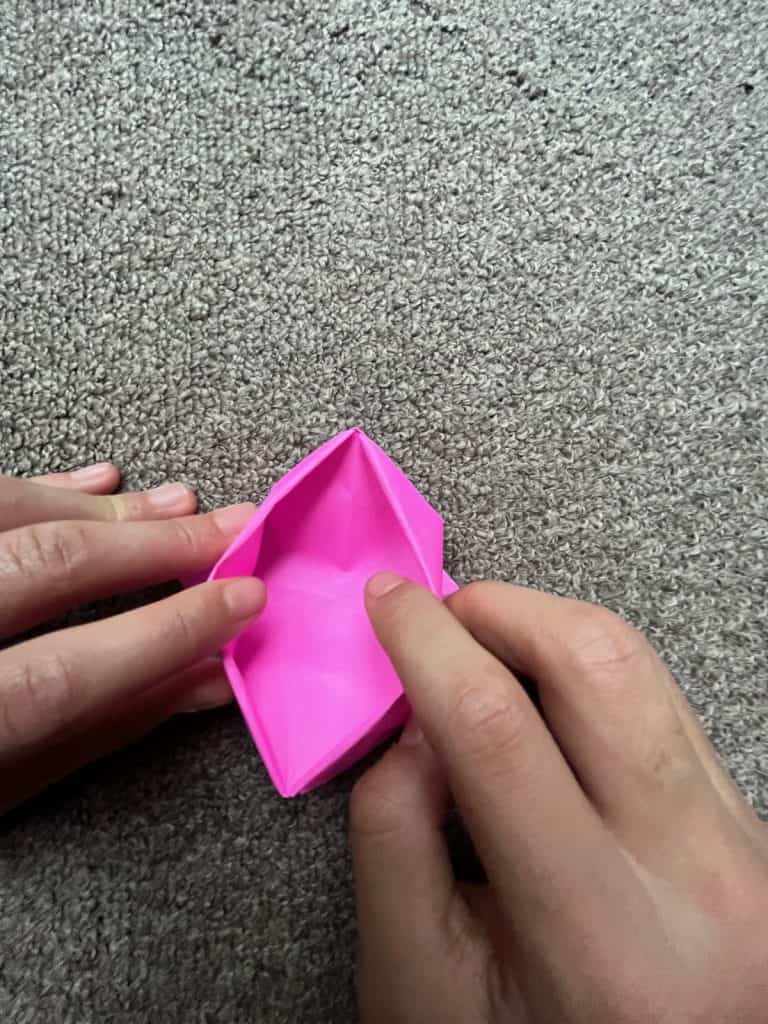 opening the bottom of origami crown