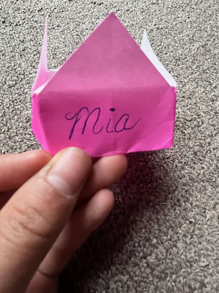 origami crown with the name mia on it