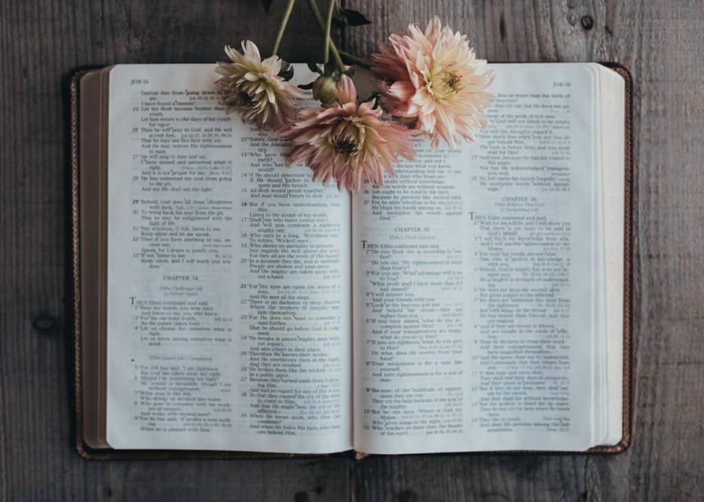Open Bible with flowers on page